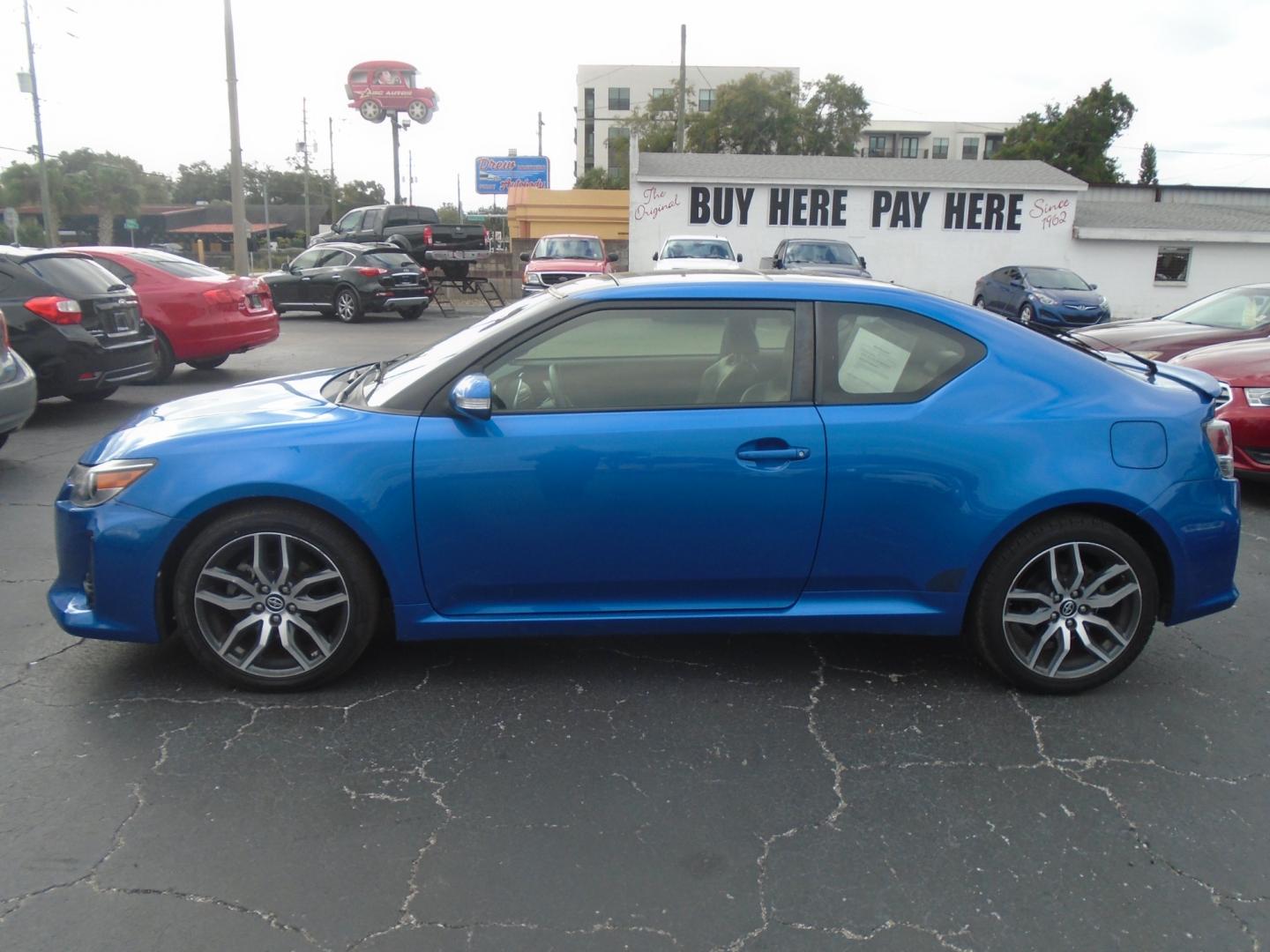 2014 Scion tC Sports Coupe 6-Spd AT (JTKJF5C75E3) with an 2.4L L4 DOHC 16V engine, 6-Speed Automatic transmission, located at 6112 N Florida Avenue, Tampa, FL, 33604, (888) 521-5131, 27.954929, -82.459534 - Photo#0